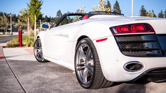 Detailed white convertible from behind